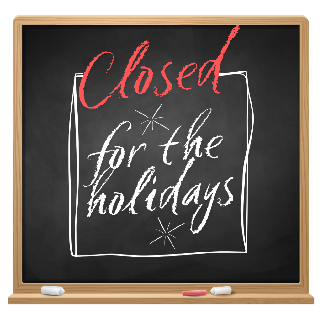 chalk board with the text closed for the holidays